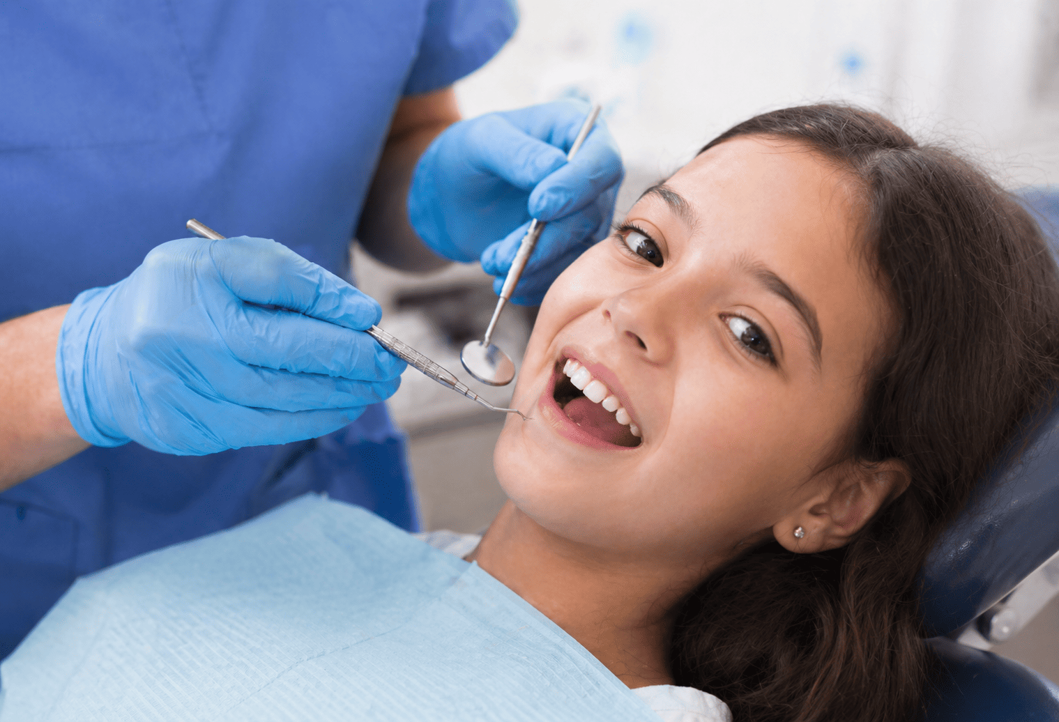 A relaxed child smiling during a gentle dental visit